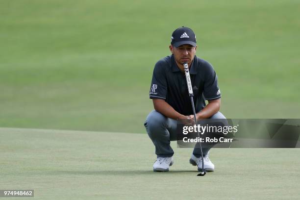 Xander Schauffele of the United States waits to putt on the fifth green during the first round of the 2018 U.S. Open at Shinnecock Hills Golf Club on...