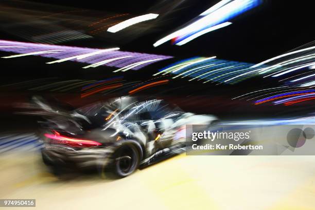 The Dempsey-Proton Racing Porsche 911 RS of Matteo Cairoli, Khaled Al Qubaisi and Giogio Roda stops for a pit stop during qualifying for the Le Mans...