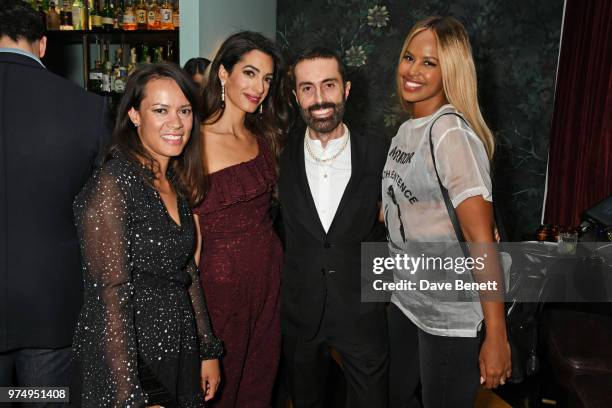 Philippa Webb, Amal Clooney, Giambattista Valli and Sabrina Dhowre attend a private dinner hosted by Edward Enninful in honour of Giambattista Valli...