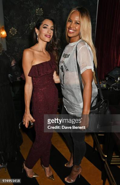 Amal Clooney and Sabrina Dhowre attend a private dinner hosted by Edward Enninful in honour of Giambattista Valli to celebrate the opening of his...