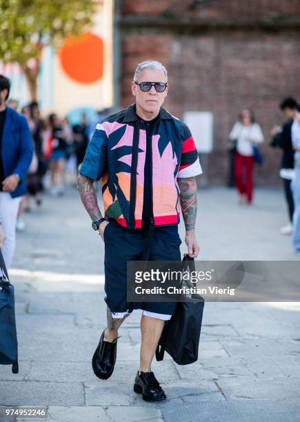 Nick Wooster wearing jacket with palm tree print, shorts is seen during the 94th Pitti Immagine Uomo on June 14, 2018 in Florence, Italy.