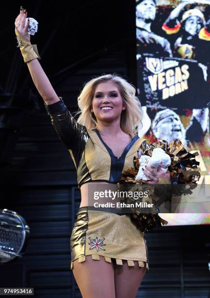 Member of the Vegas Golden Knights Golden Aces throws T-shirts to fans during the team's "Stick Salute to Vegas and Our Fans" event at the Fremont...