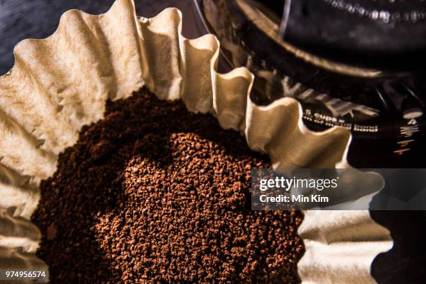 coffee grounds in dripper, java - kaffeepulver stock-fotos und bilder