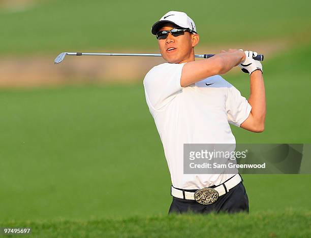 Anthony Kim plays a shot on the 14th hole during the third round of the Honda Classic at PGA National Resort And Spa on March 6, 2010 in Palm Beach...