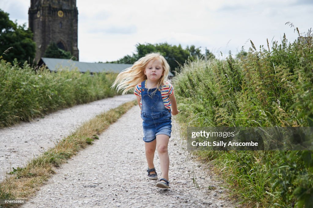 Child walking in the countryside