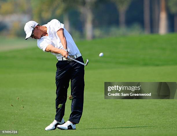 Anthony Kim plays a shot on the 4th hole during the third round of the Honda Classic at PGA National Resort And Spa on March 6, 2010 in Palm Beach...