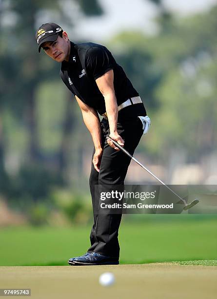 Camilo Villegas of Colombia watches a birdie attempt on the 3rd hole during the third round of the Honda Classic at PGA National Resort And Spa on...