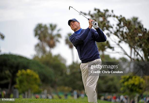 Bob Tway hits from the rough on during the second round of the Toshiba Classic at Newport Beach Country Club on March 6, 2010 in Newport Beach,...