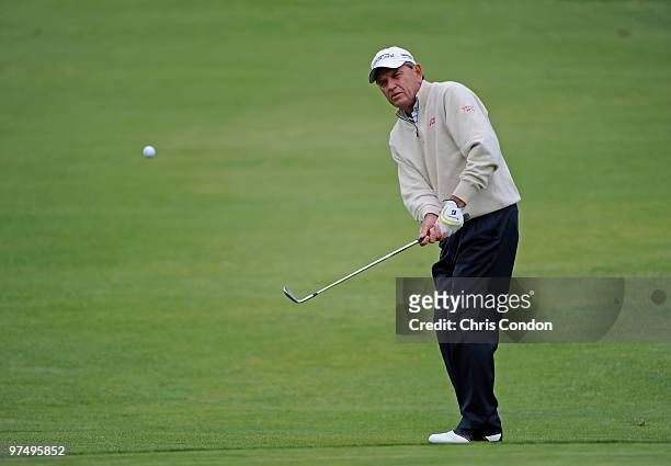 Nick Price of Zimbabwe chips to the 15th green during the second round of the Toshiba Classic at Newport Beach Country Club on March 6, 2010 in...