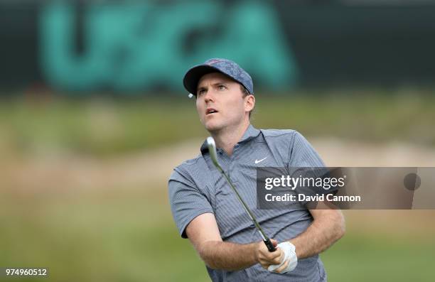 Russell Henley of the United States plays his tee shot on the 17th hole during the first round of the 2018 US Open at Shinnecock Hills Golf Club on...