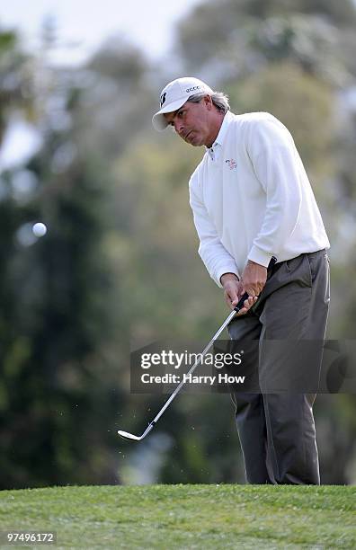 Fred Couples chips to the green on the 11th hole during the second round of the Toshiba Classic at the Newport Beach Country Club on March 6, 2010 in...