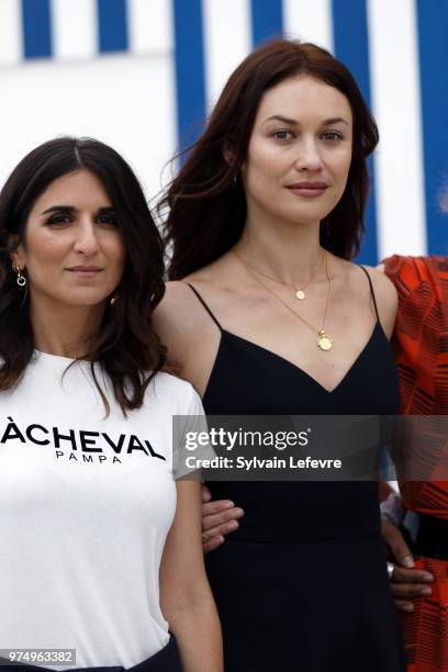 Actress and director Geraldine Nakache and actress Olga Kurylenko attend Cabourg Film Festival day 2 photocall on June 14, 2018 in Cabourg, France.