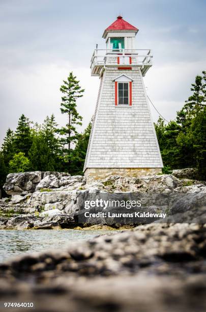 front view of lighthouse on cloudy day, ontario, canada - manitoulin stock pictures, royalty-free photos & images