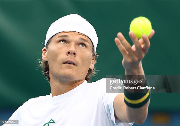 Peter Luczak of Australia serves duiring his match against Tsung-Hua Yang of Chinese Taipei during day three of the Davis Cup Asia-Oceania Zone Group...