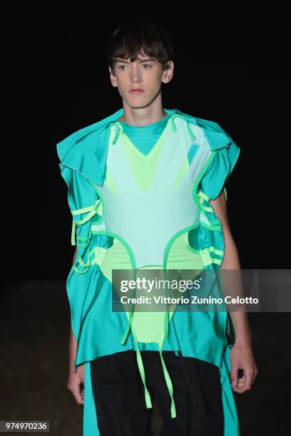 Model walks the runway at the Craig Green show during the 94th Pitti Immagine Uomo on June 14, 2018 in Florence, Italy.