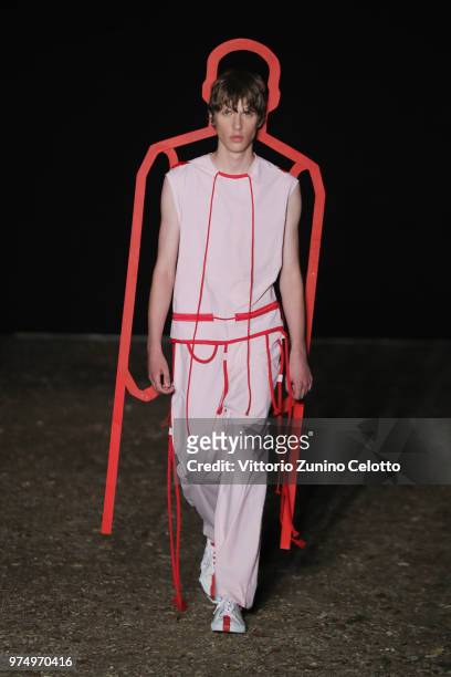 Model walks the runway at the Craig Green show during the 94th Pitti Immagine Uomo on June 14, 2018 in Florence, Italy.