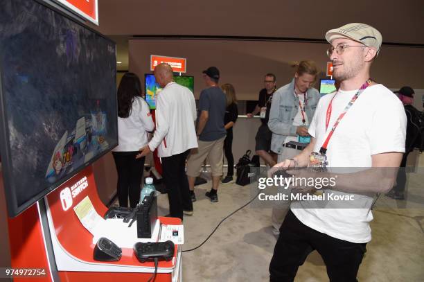 Darren Aronofsky visits the Nintendo booth during the 2018 E3 Gaming Convention at Los Angeles Convention Center on June 14, 2018 in Los Angeles,...