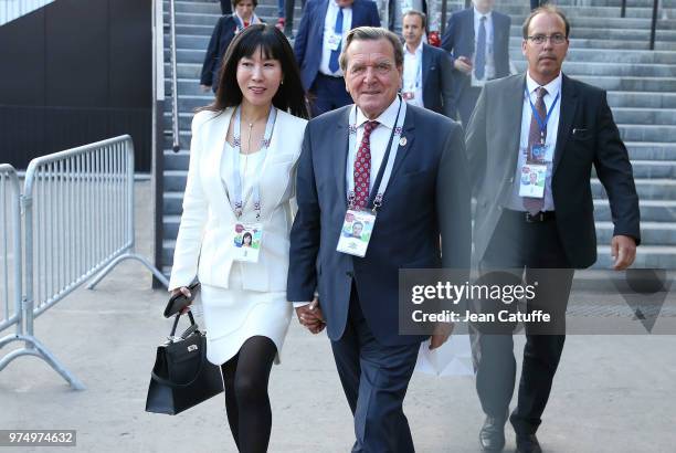 Gerhard Schroder and So-yeon Kim following the 2018 FIFA World Cup Russia group A match between Russia and Saudi Arabia at Luzhniki Stadium on June...