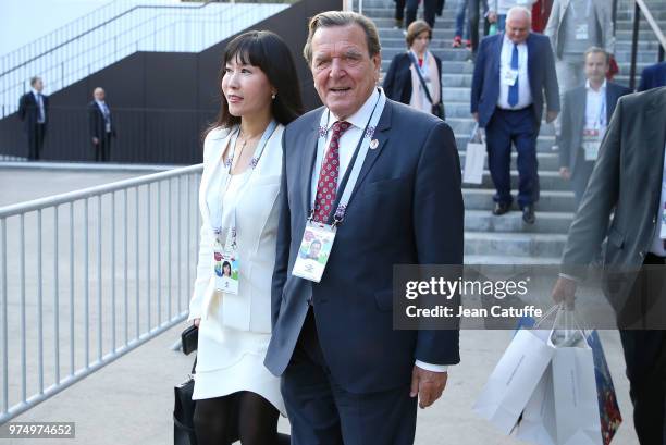 Gerhard Schroder and So-yeon Kim following the 2018 FIFA World Cup Russia group A match between Russia and Saudi Arabia at Luzhniki Stadium on June...