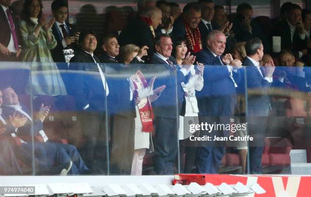 President of Bolivia Evo Morales, Gerhard Schroder and So-yeon Kim celebrate a goal for Russia during the 2018 FIFA World Cup Russia group A match...