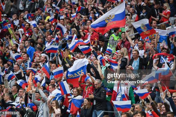 Fans of Russia celebrate during the 2018 FIFA World Cup Russia group A match between Russia and Saudi Arabia at Luzhniki Stadium on June 14, 2018 in...