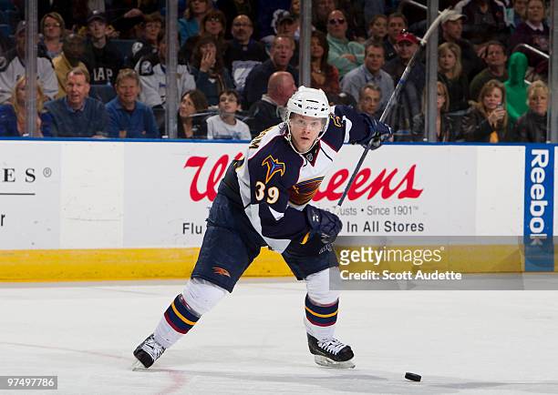 Tobias Enstrom of the Atlanta Thrashers fires the puck on net against the Tampa Bay Lightning at the St. Pete Times Forum on March 6, 2010 in Tampa,...