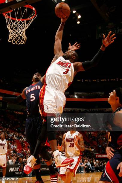 Dwyane Wade of the Miami Heat dunks against the Atlanta Hawks on March 6, 2010 at American Airlines Arena in Miami, Florida. NOTE TO USER: User...