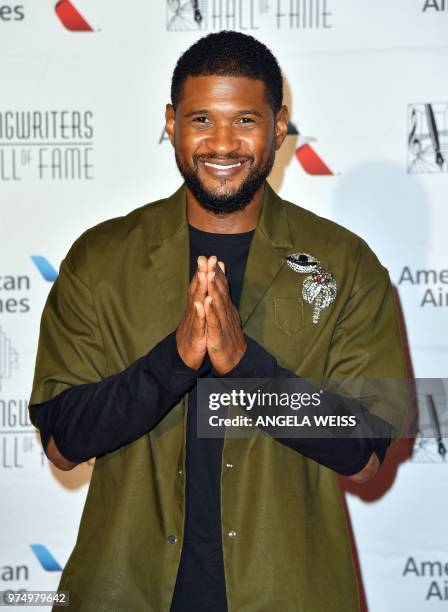 Singer/songwriter Usher attends the Songwriters Hall of Fame 49th Annual Induction and Awards Dinner at New York Marriott Marquis Hotel on June 14,...