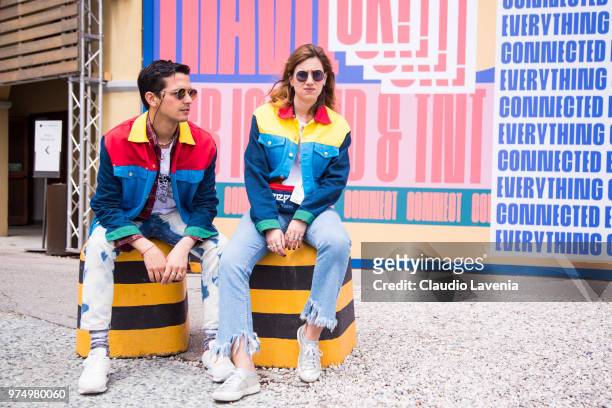 Alessandro Enriquez and guest are wearing Alessandro Enriquez jacket during the 94th Pitti Immagine Uomo at Fortezza Da Basso on June 14, 2018 in...