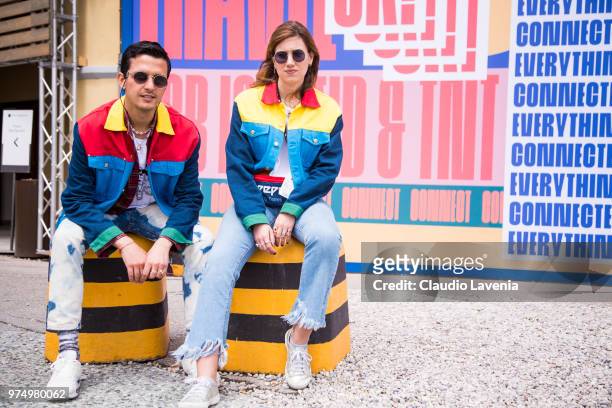 Alessandro Enriquez and guest are wearing Alessandro Enriquez jackets during the 94th Pitti Immagine Uomo at Fortezza Da Basso on June 14, 2018 in...
