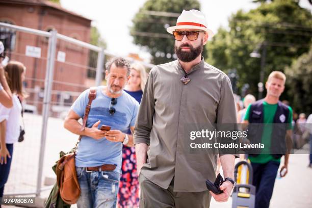 Raimondo Rossi wearing a white hat and military green shirt, is seen during the 94th Pitti Immagine Uomo at Fortezza Da Basso on June 14, 2018 in...