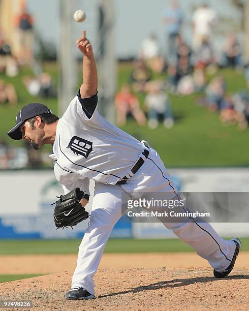 Daniel Schlereth of the Detroit Tigers pitches against the Baltimore Orioles during a spring training game at Joker Marchant Stadium on March 6, 2010...