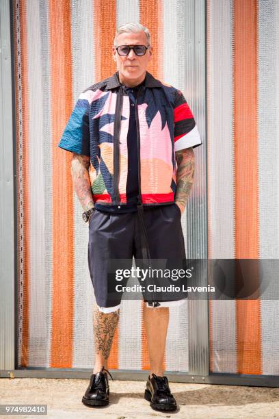 Nick Wooster, wearing colorfull jacket and black shorts, is seen during the 94th Pitti Immagine Uomo at Fortezza Da Basso on June 14, 2018 in...