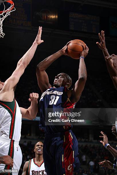 Jawad Williams of the Cleveland Cavaliers shoots a layup against Andrew Bogut of the Milwaukee Bucks on March 6, 2010 at the Bradley Center in...