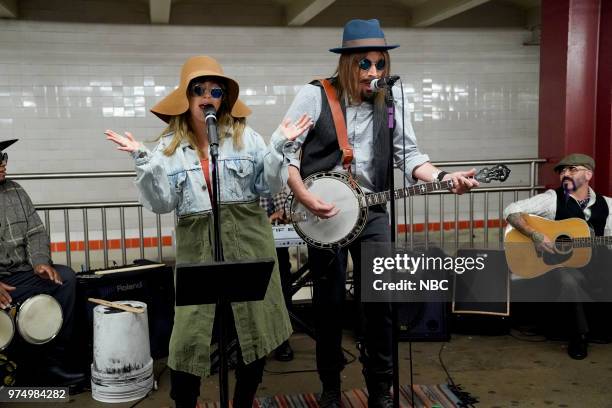 Episode 0884 -- Pictured: Singer Christina Aguilera with Host Jimmy Fallon during a "Subway Busking" on June 14, 2018 --