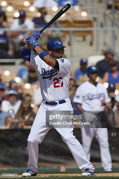 Matt Kemp of the Los Angeles Dodgers bats against the Chicago White Sox during a spring training game at The Ballpark at Camelback Ranch on March 6,...