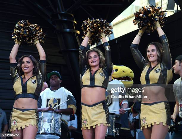 Members of the Vegas Golden Knights Golden Aces cheer during the team's "Stick Salute to Vegas and Our Fans" event at the Fremont Street Experience...