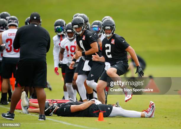 Atlanta Falcons quarterback Matt Ryan runs through a drill during Atlanta Falcons minicamp at Falcons headquarters.