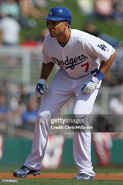 James Loney of the Los Angeles Dodgers fields against the Chicago White Sox during a spring training game at The Ballpark at Camelback Ranch on March...