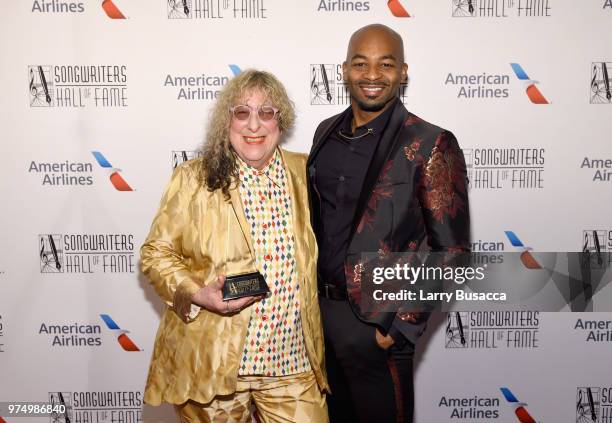 Songwriters Hall of Fame Inductee Allee Willis and Brandon Victor Dixon pose backstage during the Songwriters Hall of Fame 49th Annual Induction and...