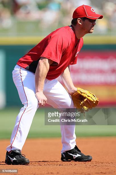 Scott Rolen of the Cincinnati Reds fields at third base against the Cleveland Indians during a spring training game at Goodyear Ballpark on March 5,...