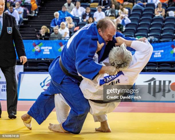 Dermot Killeen of Ireland throws Herbert Arndt of Germany for an ippon to win their second round M7- o100kgs contest during day 1 of the 2018 Glasgow...