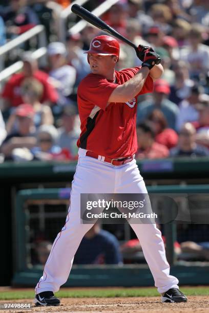 Jay Bruce of the Cincinnati Reds at bat against the Cleveland Indians during a spring training game at Goodyear Ballpark on March 5, 2010 in...