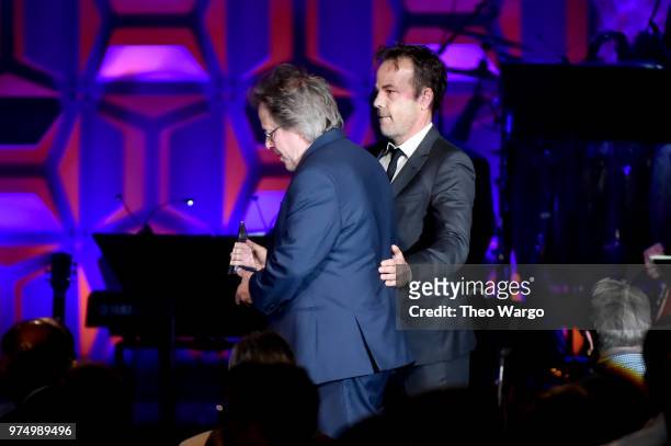 Songwriters Hall of Fame Inductee Steve Dorff accepts award from actor Stephen Dorff onstage during the Songwriters Hall of Fame 49th Annual...