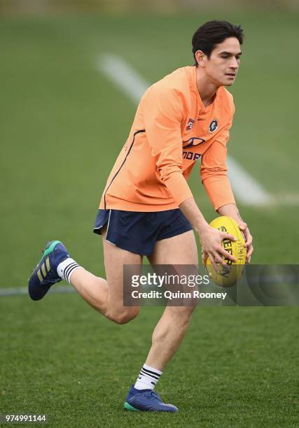 Zac Fisher of the Blues kicks during a Carlton Blues AFL training session at Ikon Park on June 15, 2018 in Melbourne, Australia.