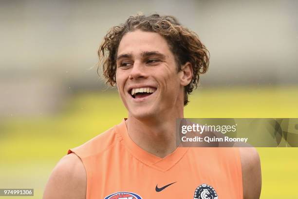 Charlie Curnow of the Blues has a laugh during a Carlton Blues AFL training session at Ikon Park on June 15, 2018 in Melbourne, Australia.