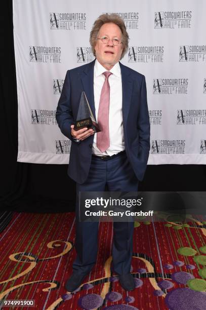 Songwriters Hall of Fame Inductee Steve Dorff poses with his award backstage during the Songwriters Hall of Fame 49th Annual Induction and Awards...