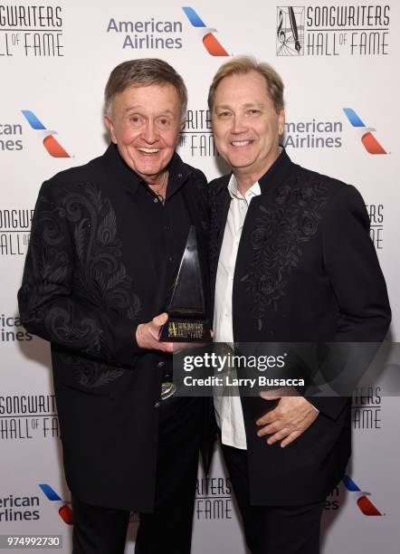 Songwriters Hall of Fame Inductee Bill Anderson and Steve Wariner pose backstage during the Songwriters Hall of Fame 49th Annual Induction and Awards...