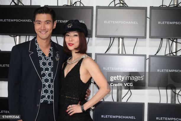 South Korean singer Choi Si-won and actress Sammi Cheng attend Le Temps Chanel exhibition on June 14, 2018 in Hong Kong, China.