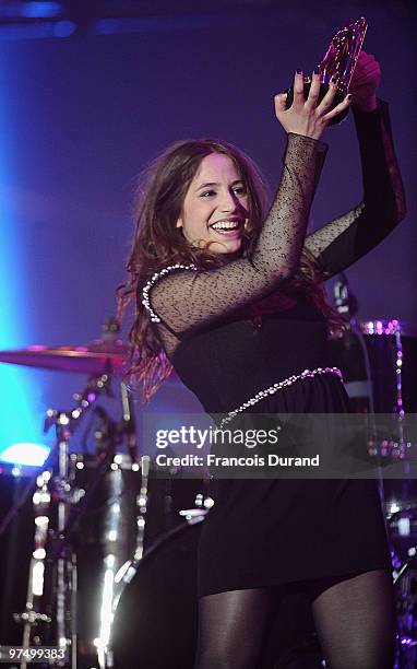 French singer Izia receives an award during the 25th Victoires de la Musique yearly French music awards ceremony at Zenith de Paris on March 6, 2010...